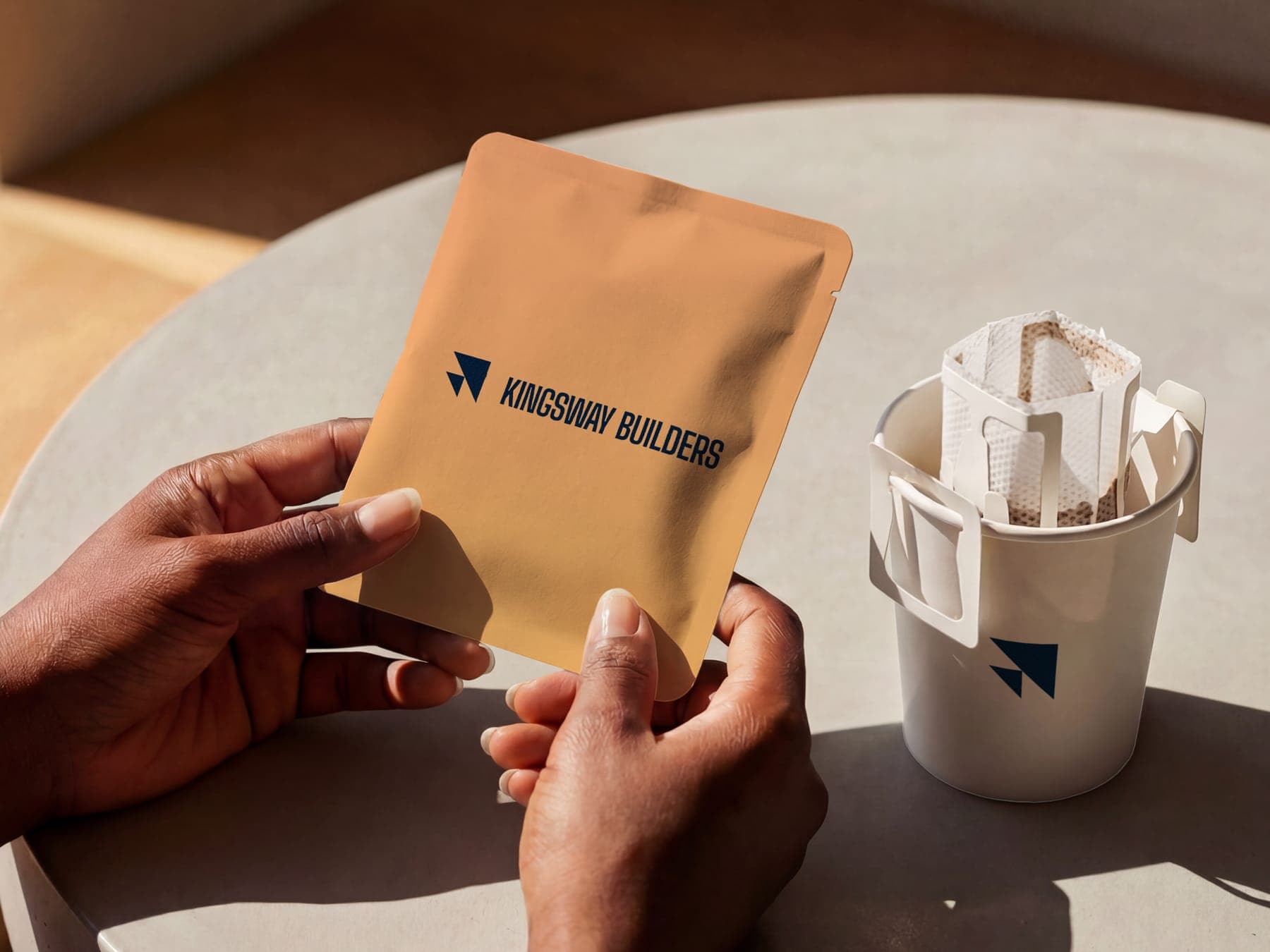 The coffee: a 3D render of the Kingsway Builders identity