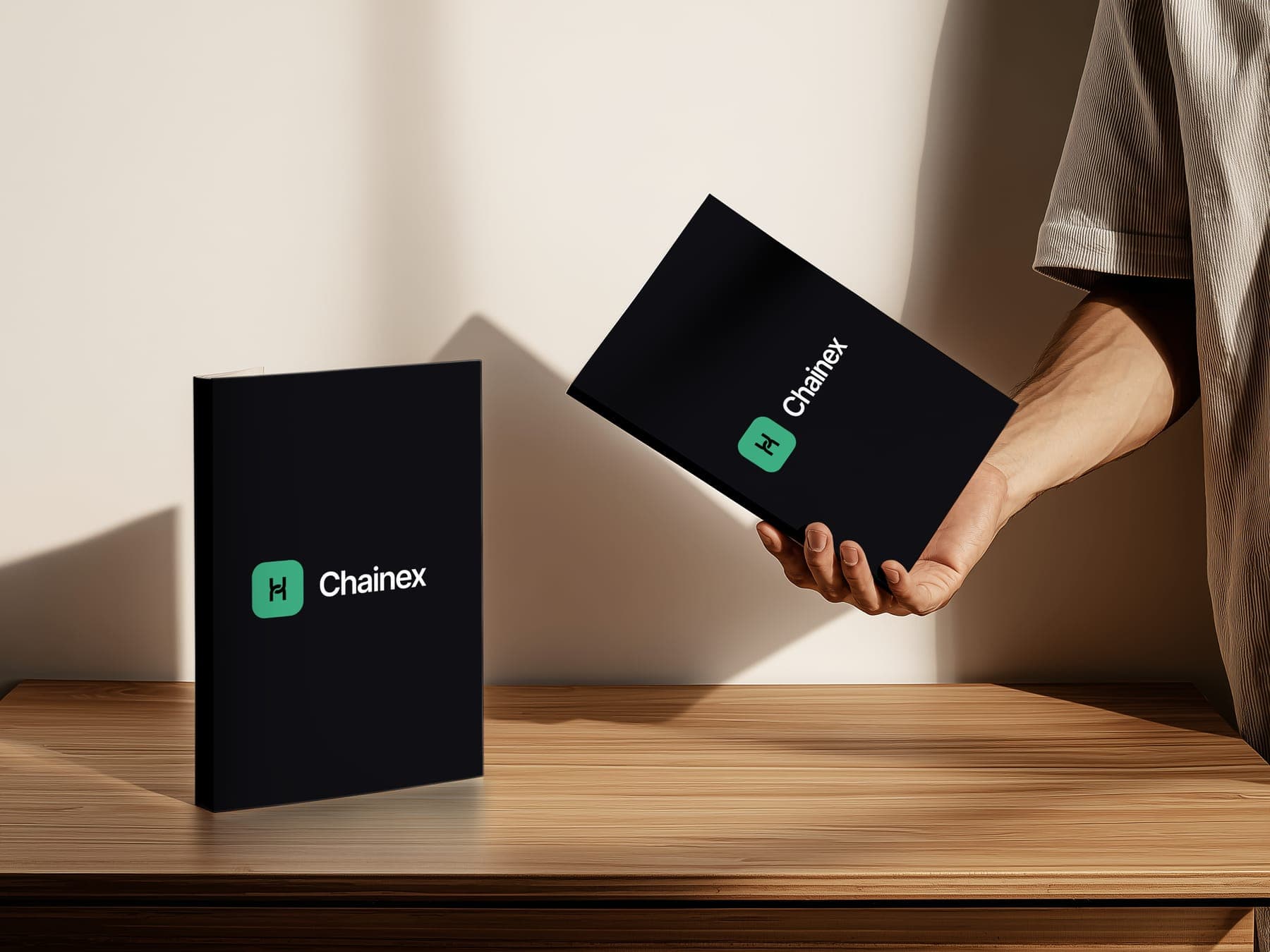 The notebooks: a 3D render of the Chainex identity