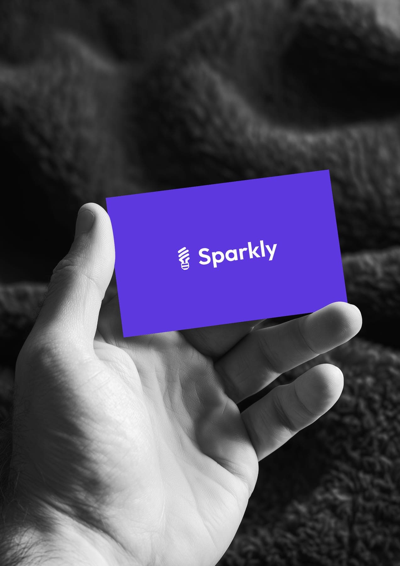 The business card: a 3D render of the Sparkly identity